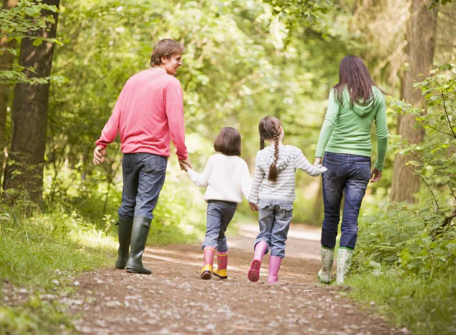 family walking in a park