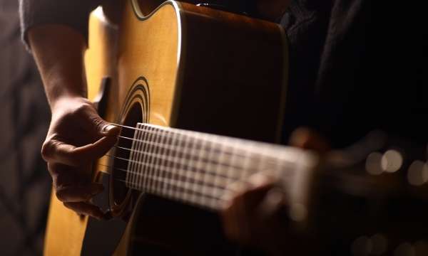 man playing guitar