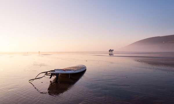 Surf board on beach