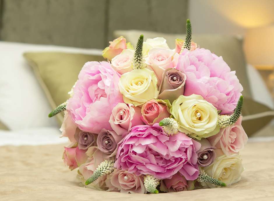 Brides Bouquet on Hotel Bed