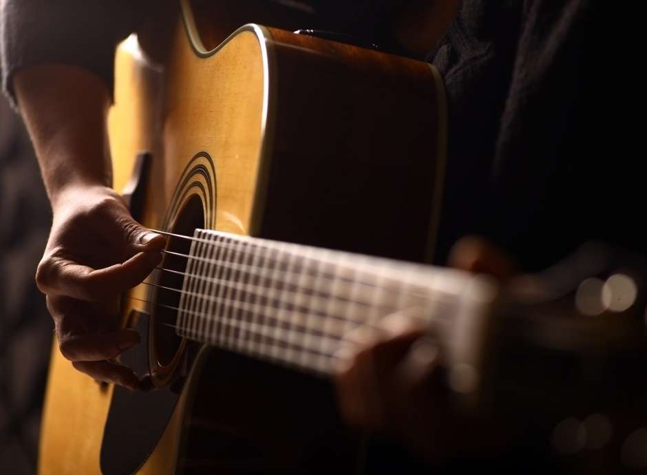 man playing guitar