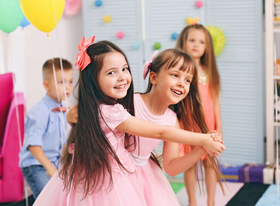 children playing at a party