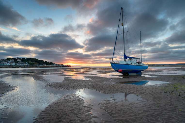 Sunset Over Boats on the Beach at Instow North Devon