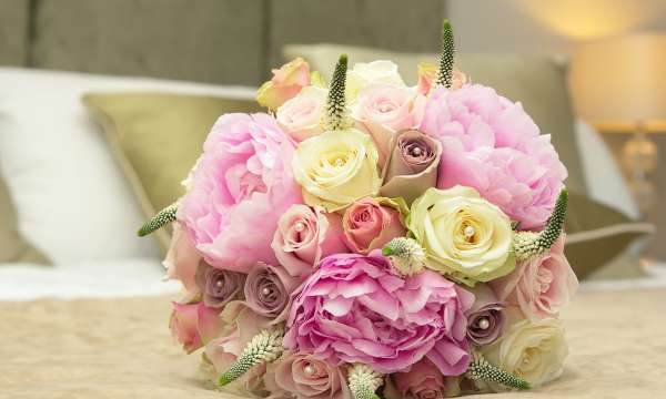 Brides Bouquet on Hotel Bed