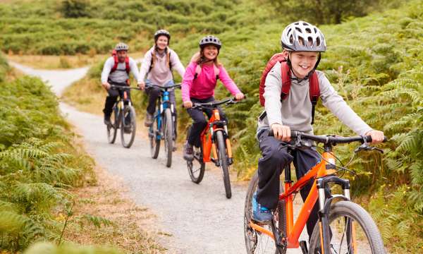 Family of four cycling